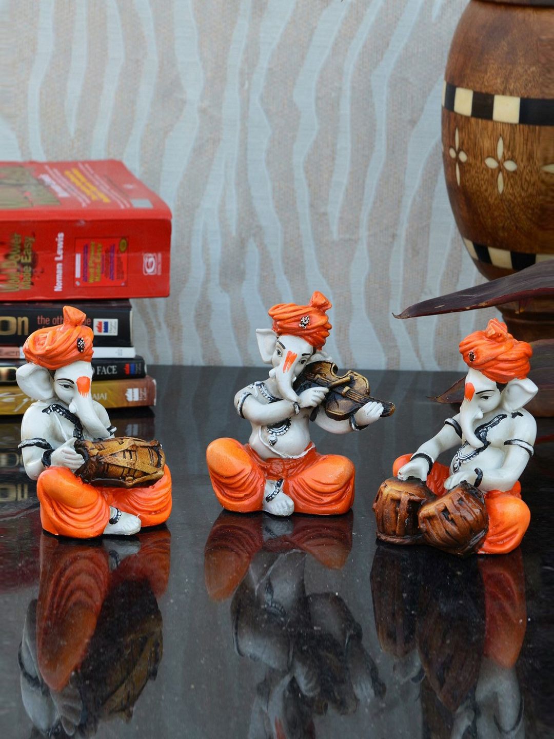 eCraftIndia Set of 3 Orange Handcrafted Polyresin Lord Ganesha-Shaped Showpieces Price in India