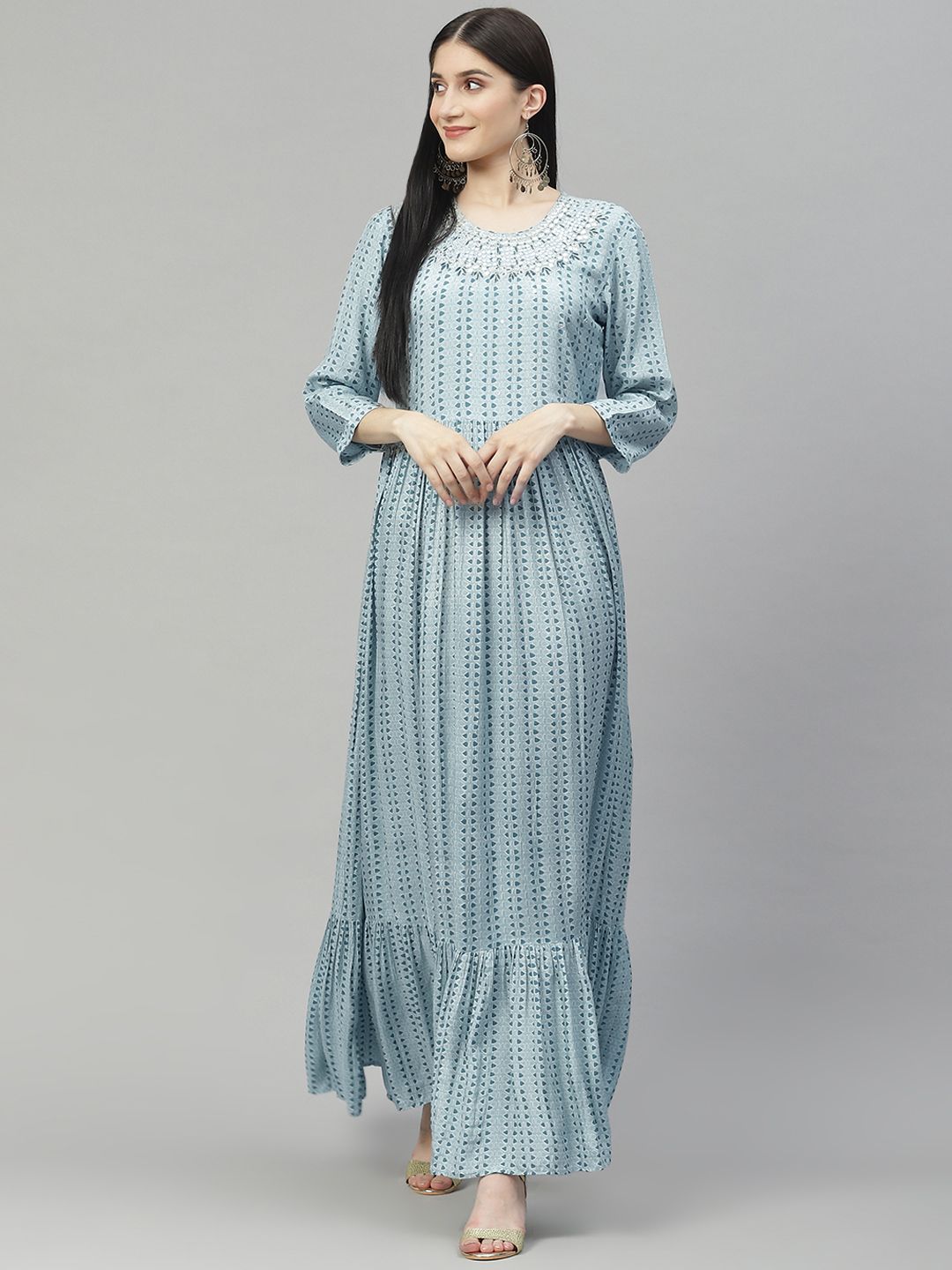 Divena Blue Printed Mirror Work Detail Muslin Maxi Flared Gown Price in India