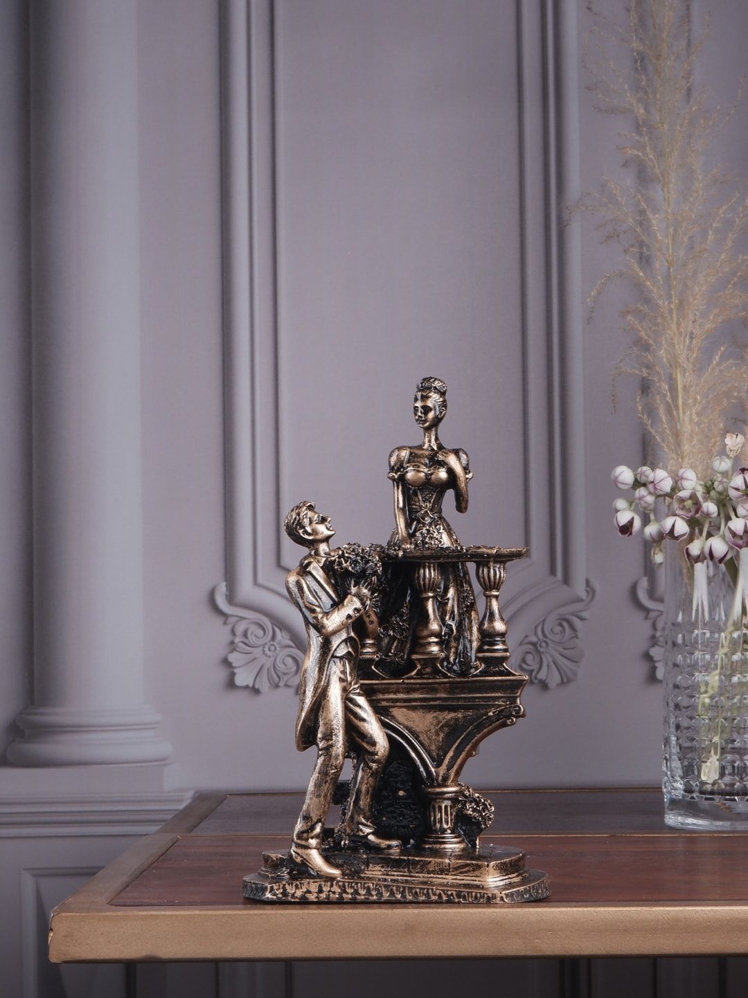 THE WHITE INK DECOR Metallic-Colored Textured Couple Figurine Showpieces Price in India