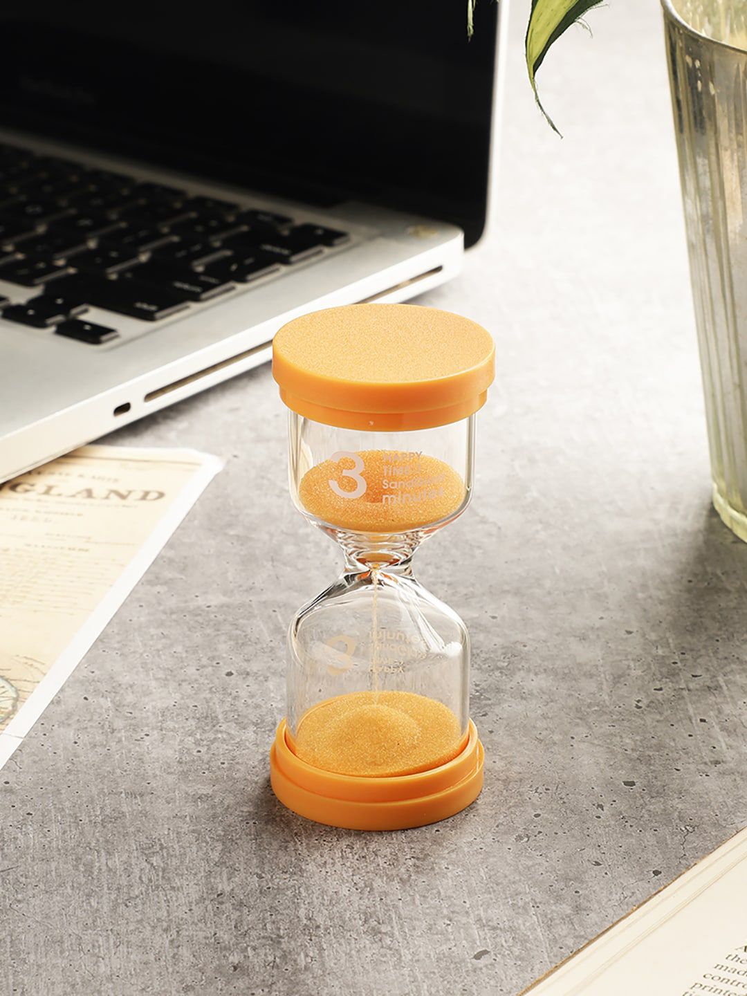 EXIM DECOR Orange Colored Sand Timer Curio Showpieces Price in India