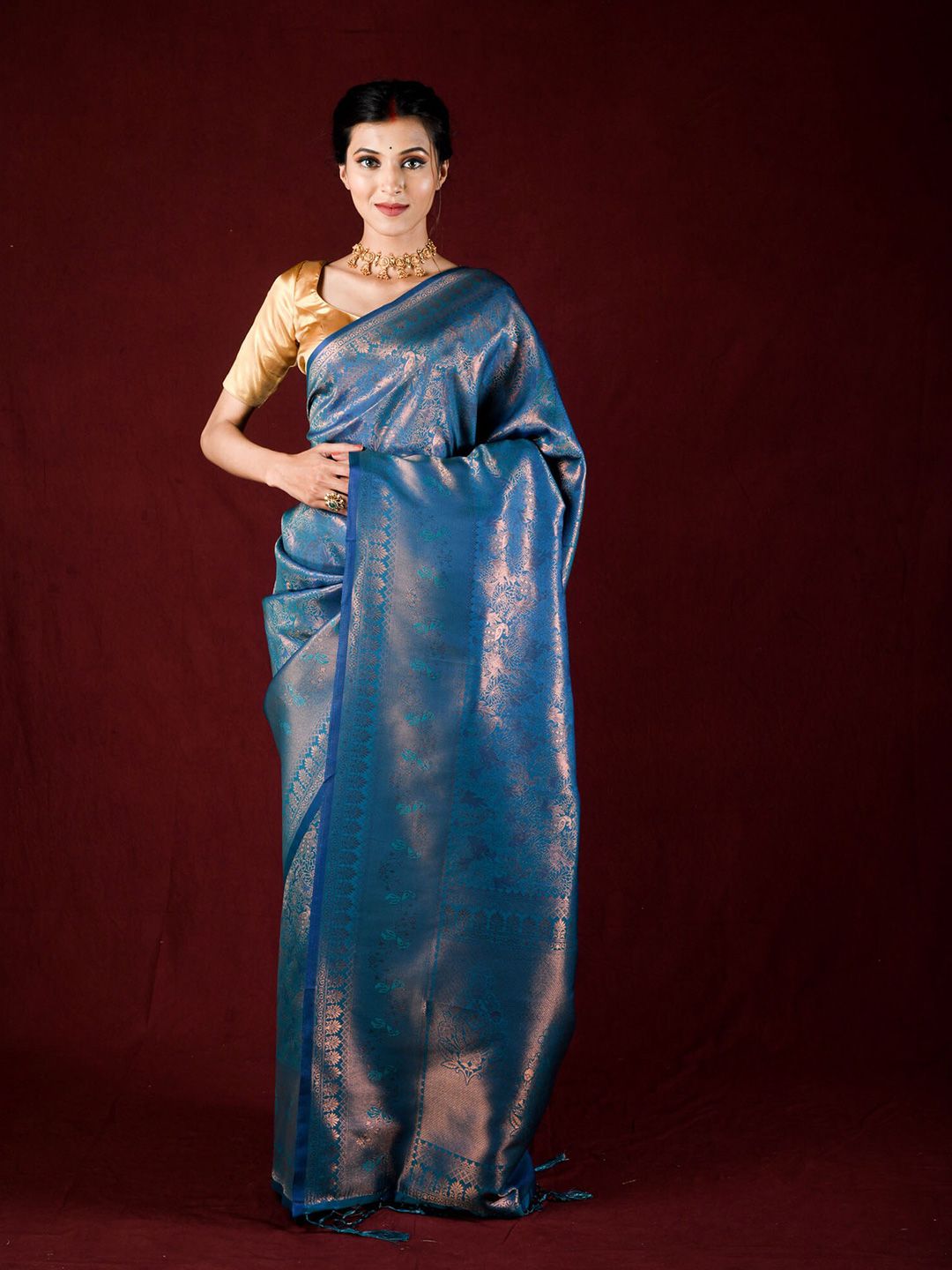 Exclusiva Blue & Copper-Toned Ethnic Motifs Zari Saree Price in India