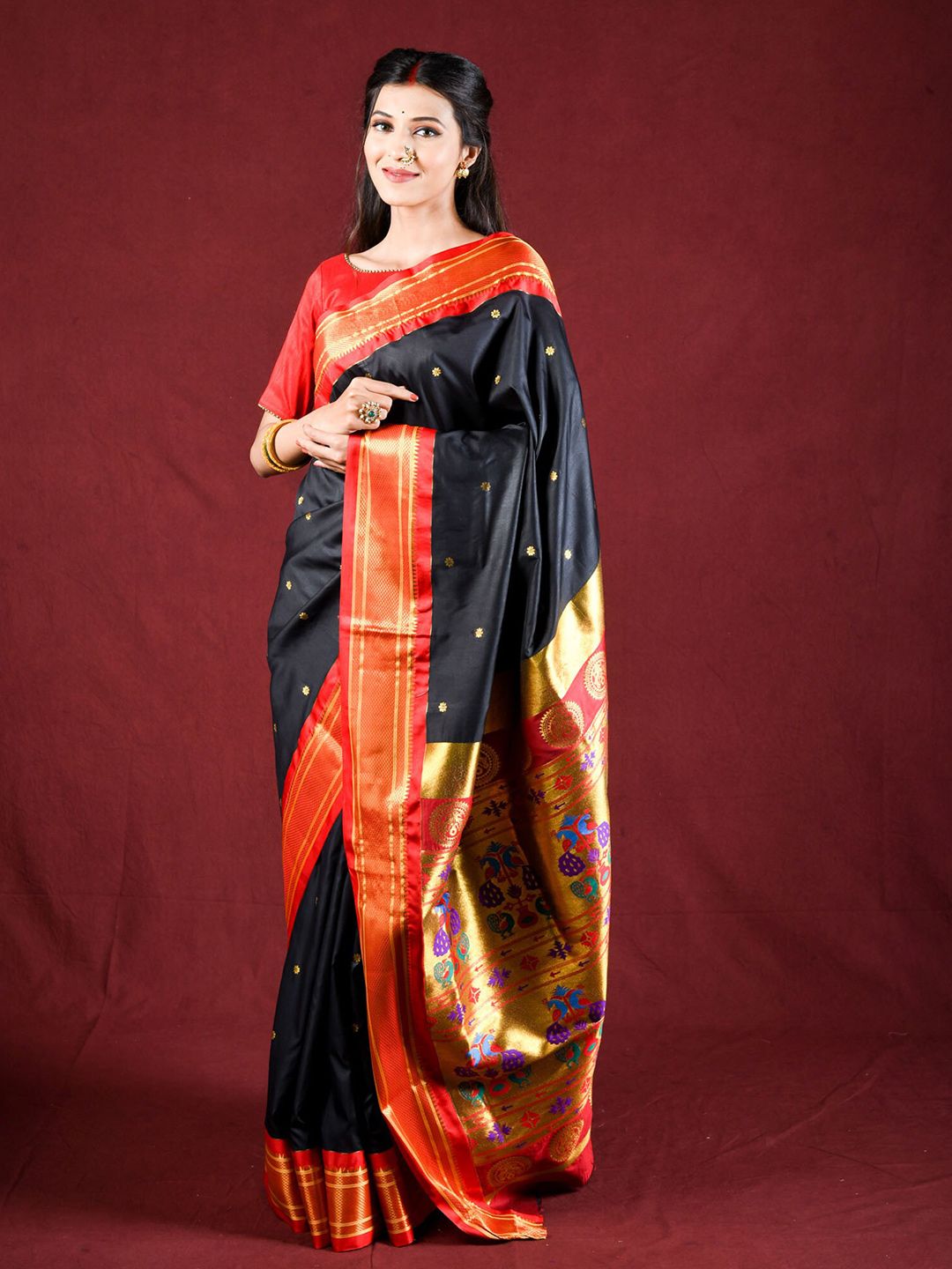 Exclusiva Black & Orange Woven Design Zari Silk Blend Paithani Saree Price in India