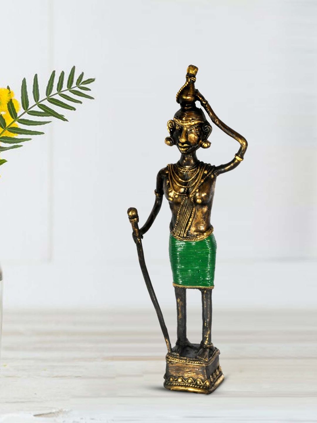 SHREE KALA HOME DECOR Bronze-Toned & Green Tribal Lady With Stick Showpieces Price in India
