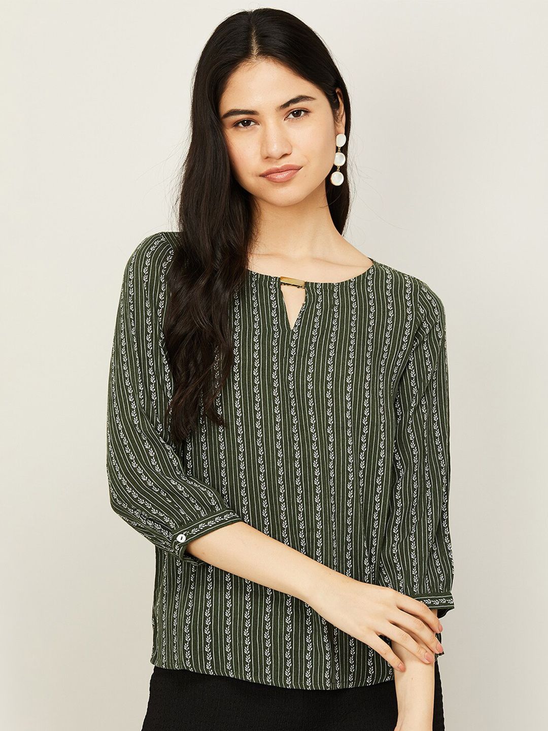 Fame Forever by Lifestyle Olive Green Printed Keyhole Neck Top Price in India