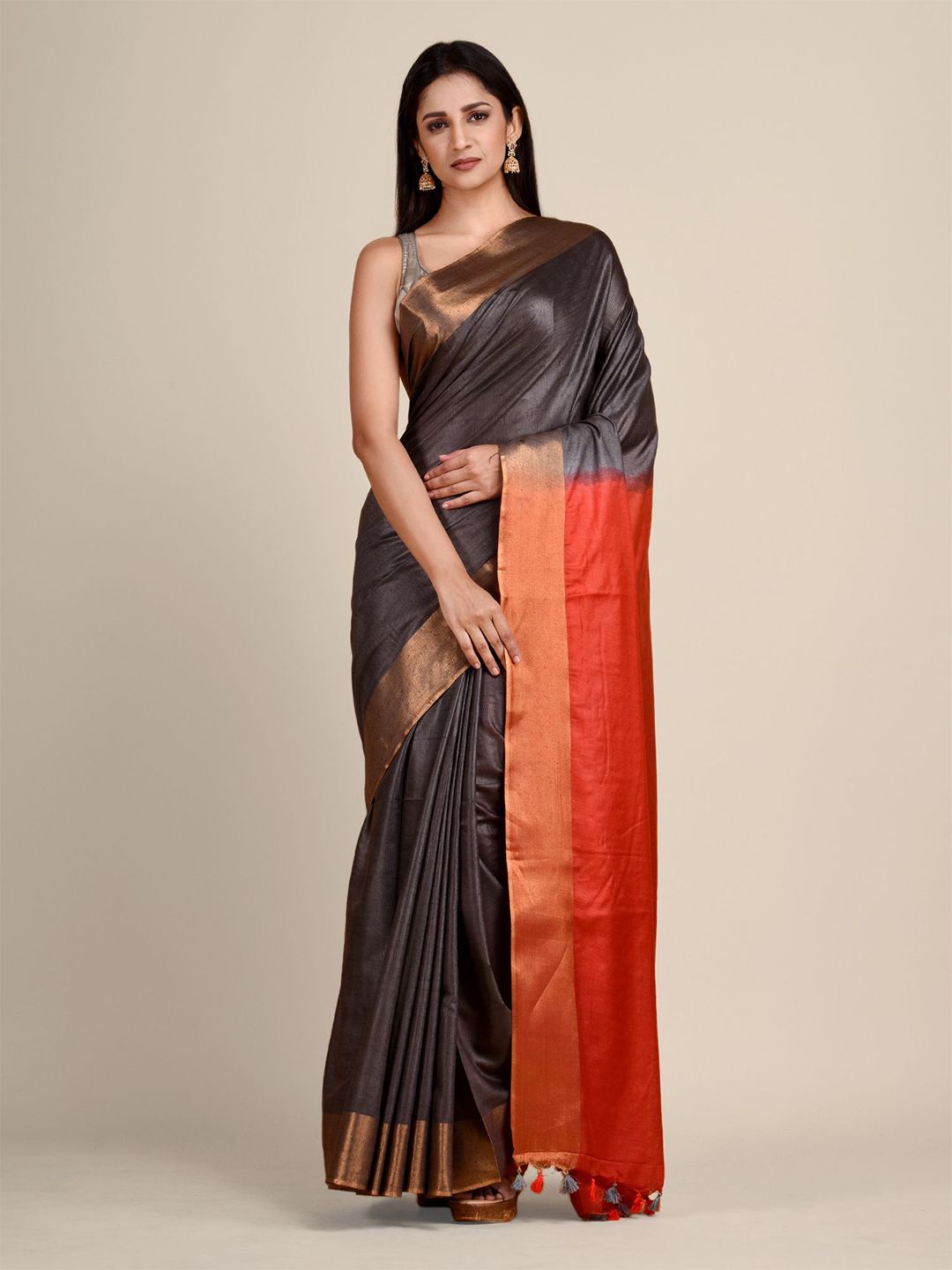Arhi Black & Orange Solid Zari Saree Price in India