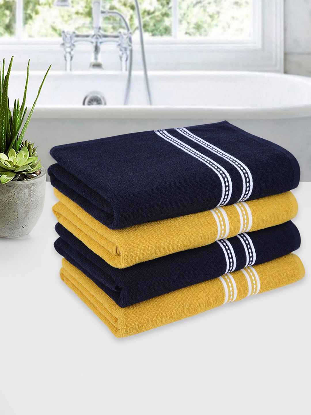 ROMEE Set Of 4 Yellow and Navy Blue Solid 500 GSM Cotton Bath Towels Price in India
