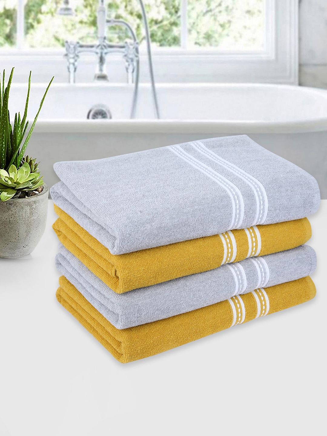 ROMEE Set Of 4 Yellow & Silver Solid 500 GSM Cotton Bath Towels Price in India