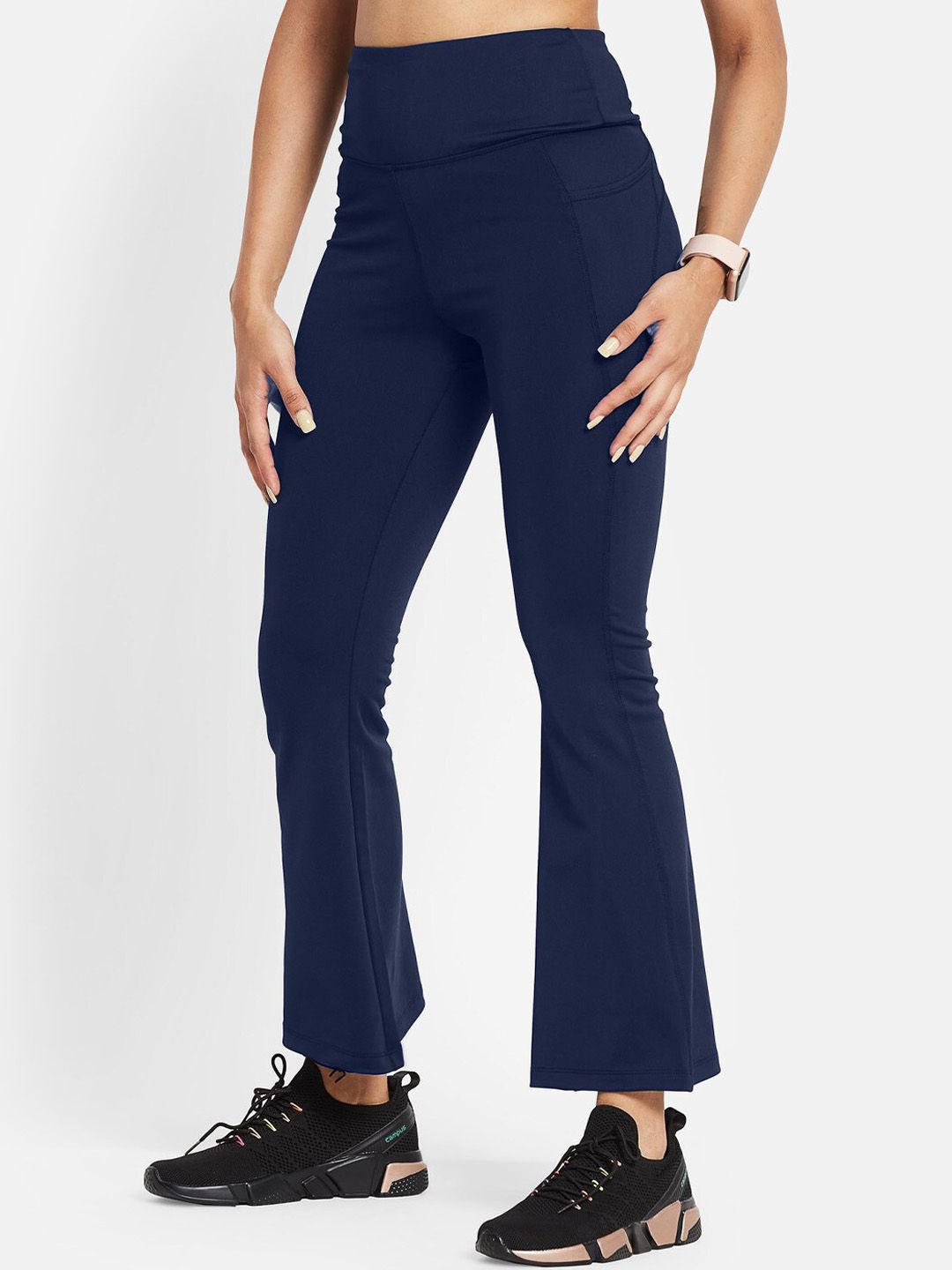 KICA Women Navy Blue Rapid-Dry High Rise Flare Featuring Bootcut Silhoutte Track Pants Price in India