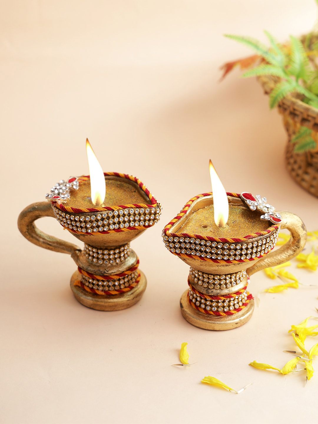 Aapno Rajasthan Set Of 2 Gold-Coloured Gel Filled Diyas Price in India
