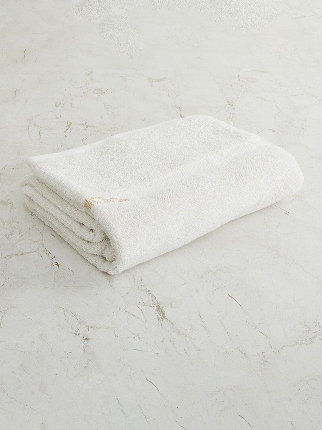 Home Centre Off White Solid 380 GSM Cotton Bath Towel Price in India