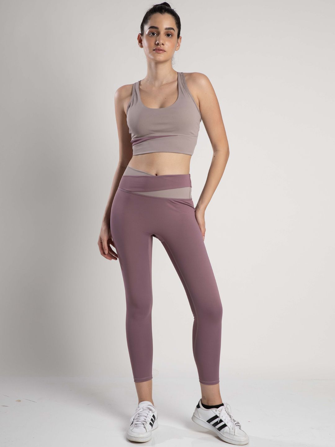SKNZ Women Mauve Solid Sports Tracksuit Price in India