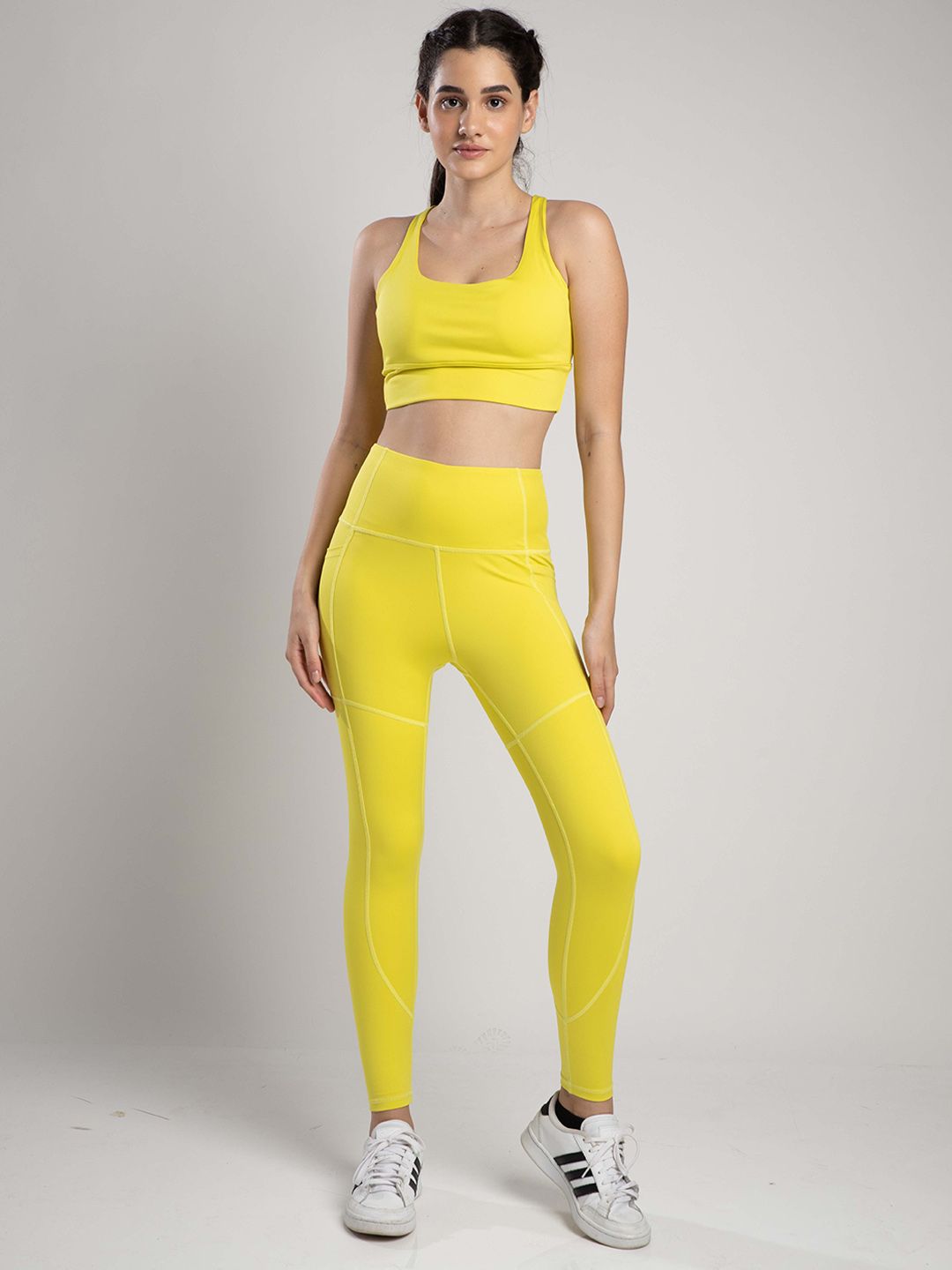 SKNZ Women Yellow Solid Antimicrobial Tights Price in India