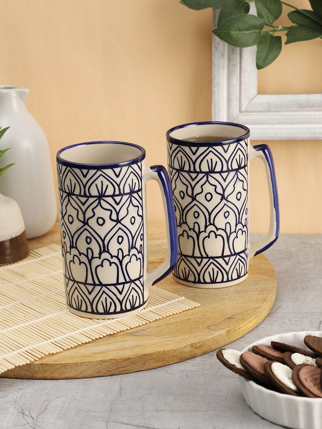 VarEesha Off White & Blue Handcrafted and Hand Painted Ceramic Glossy Mugs Price in India