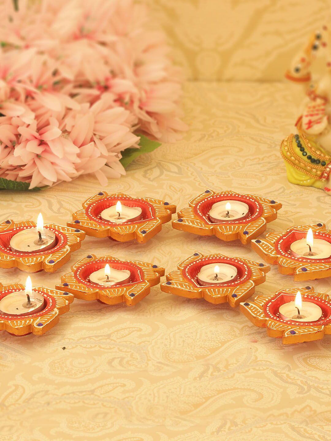 TIED RIBBONS Set of 8 Red & Gold-Coloured Textured Diyas Price in India
