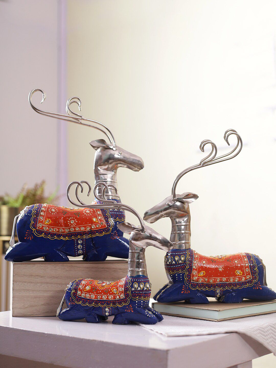 Aapno Rajasthan Set of 3 Blue & Orange Reindeer Showpieces Price in India