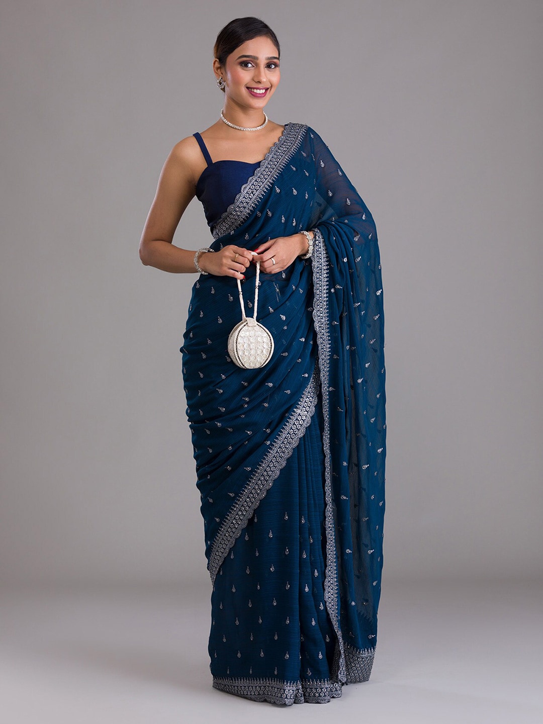 Koskii Blue & Silver-Toned Embellished Beads and Stones Heavy Work Saree Price in India