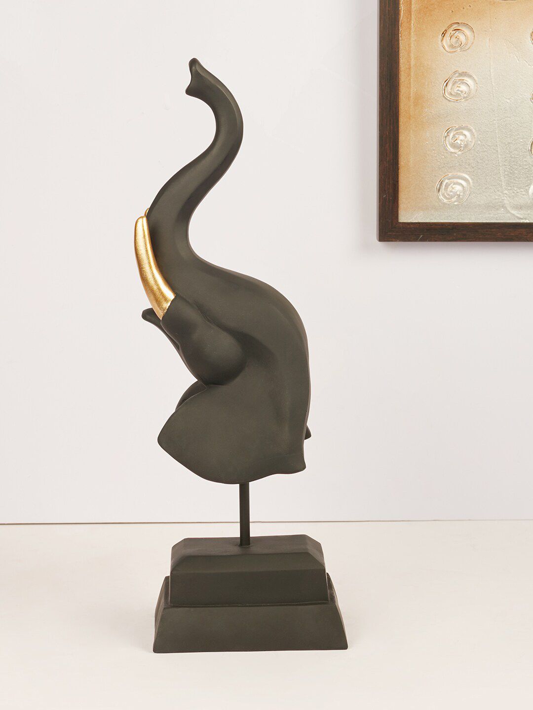 HomeTown Gold-Toned & Black Solid Polyresin Modern Elephant Face Figurine Showpieces Price in India
