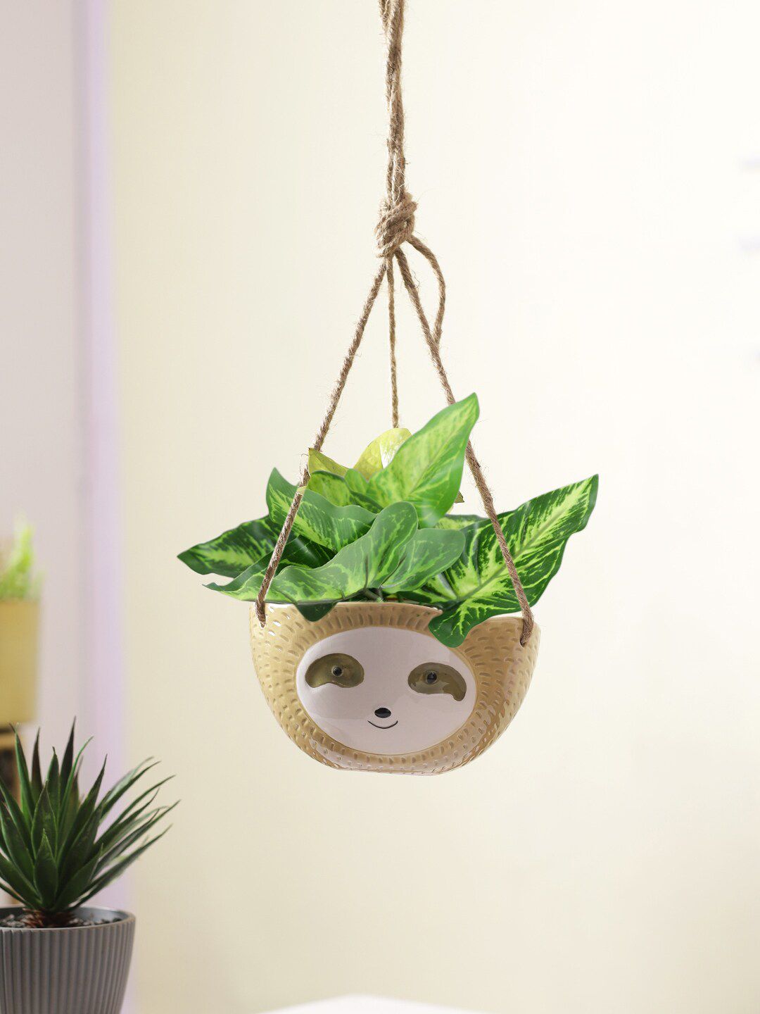 TAYHAA Beige Baby Face Hanging Ceramic Planter Price in India