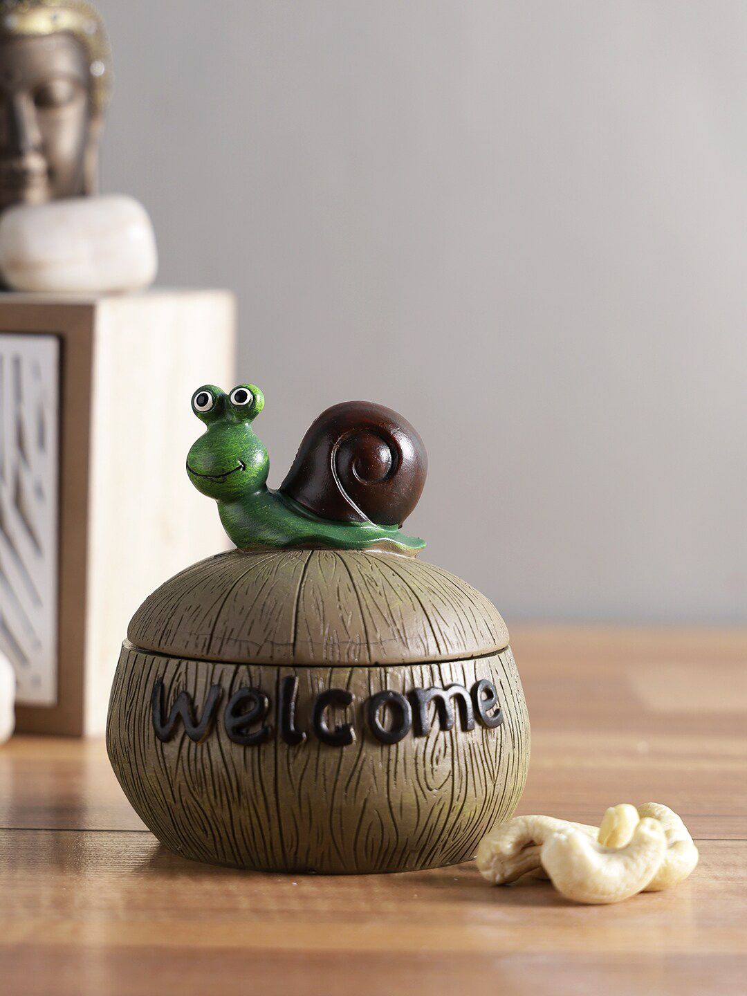 TAYHAA Brown & Green Textured Snail Jar Showpiece Price in India