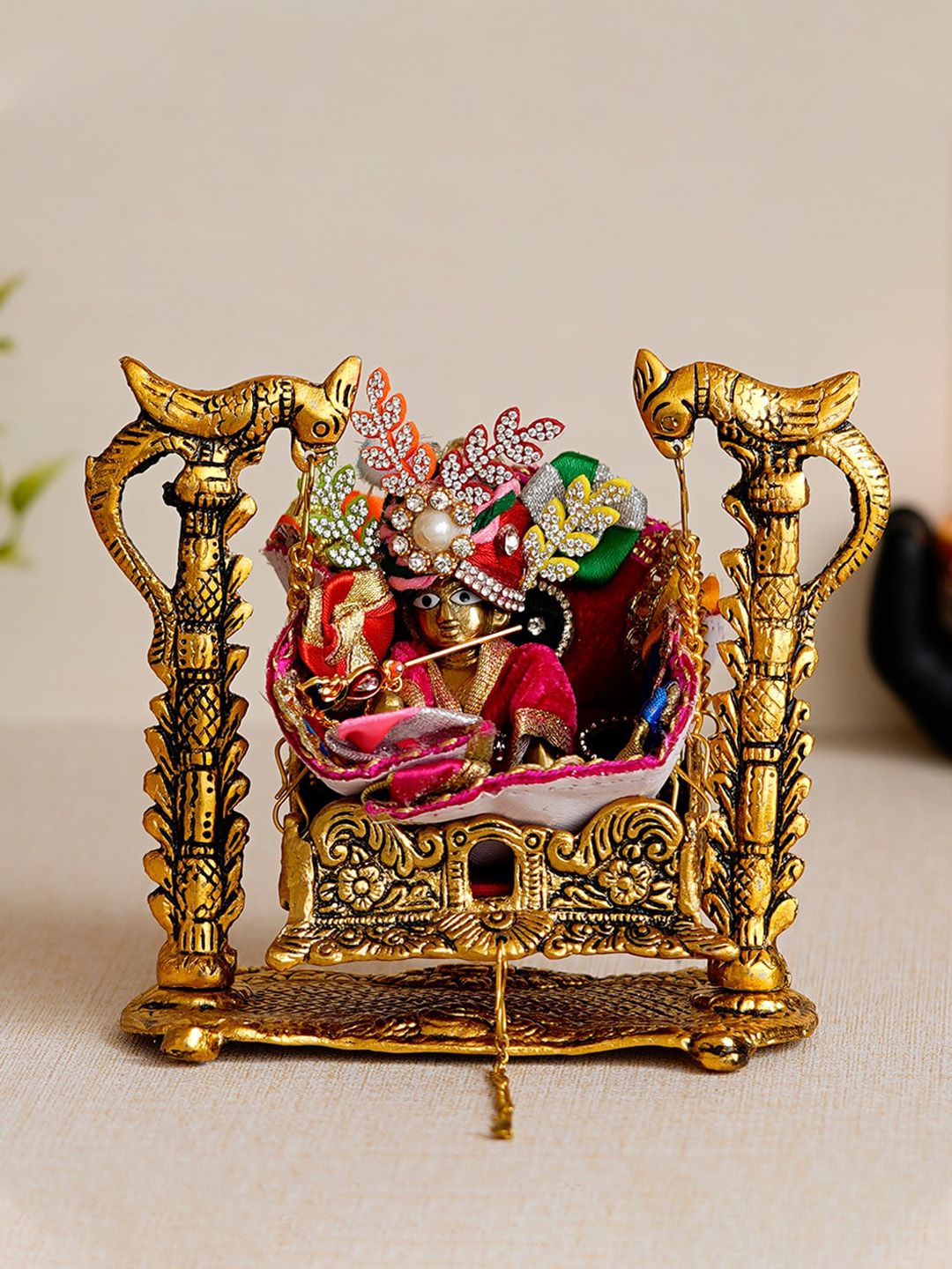 eCraftIndia Gold-Toned Bal Gopal On A Decorative Swing Showpiece Price in India