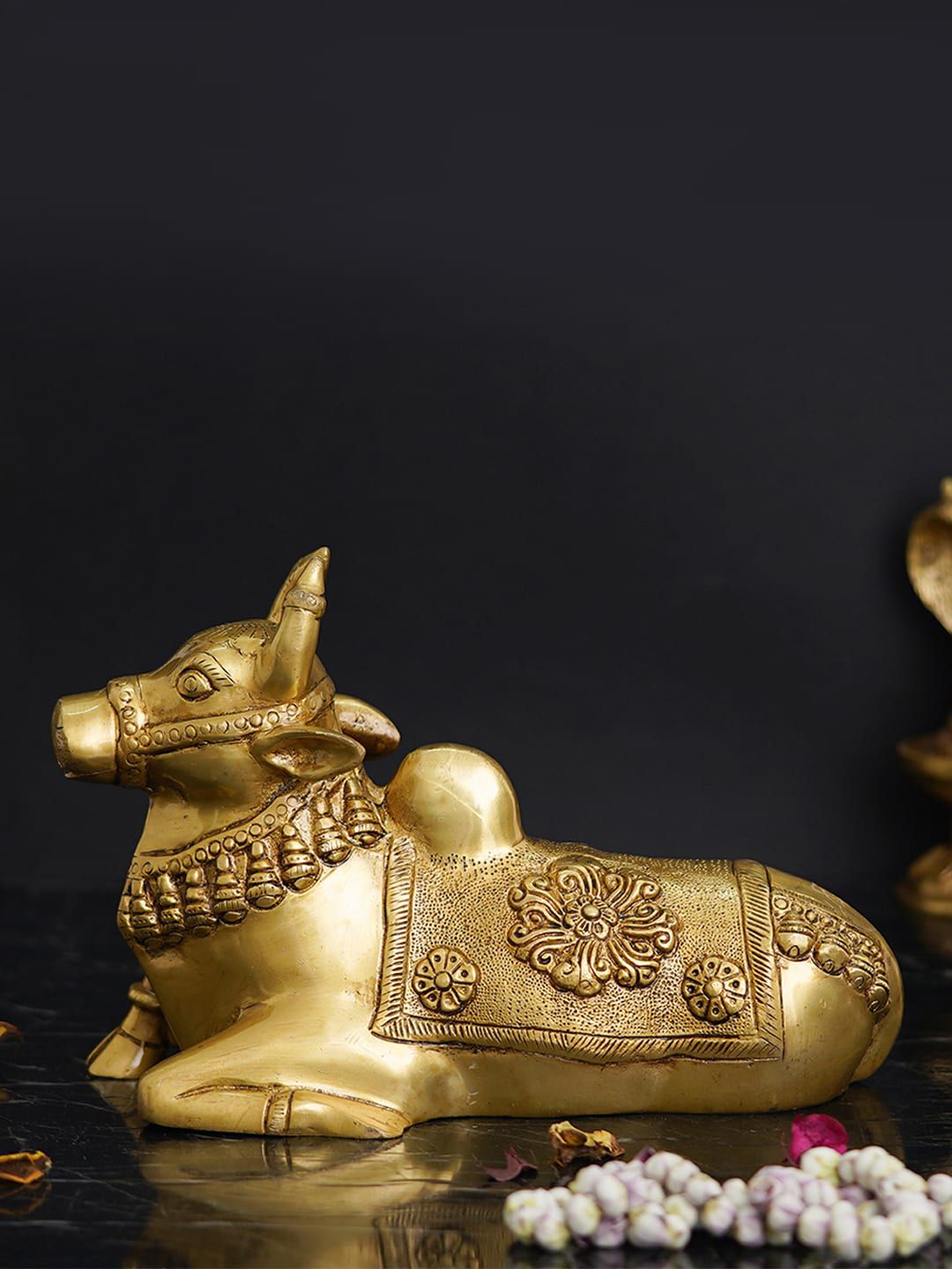 eCraftIndia Gold-Toned Nandi Cow Showpiece Price in India