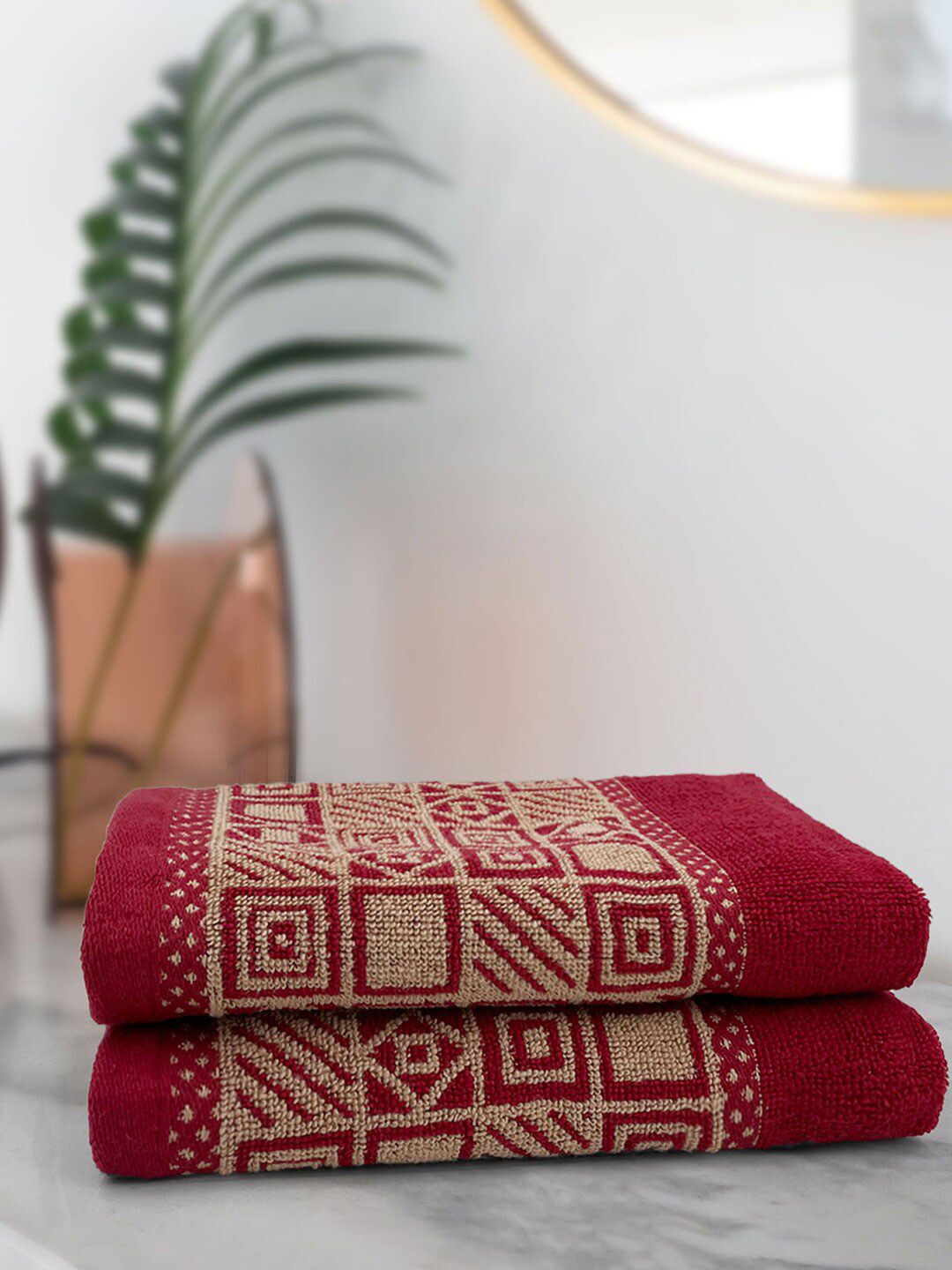 Aura Set of 2 Maroon Printed 380 GSM Cotton Hand Towels Price in India