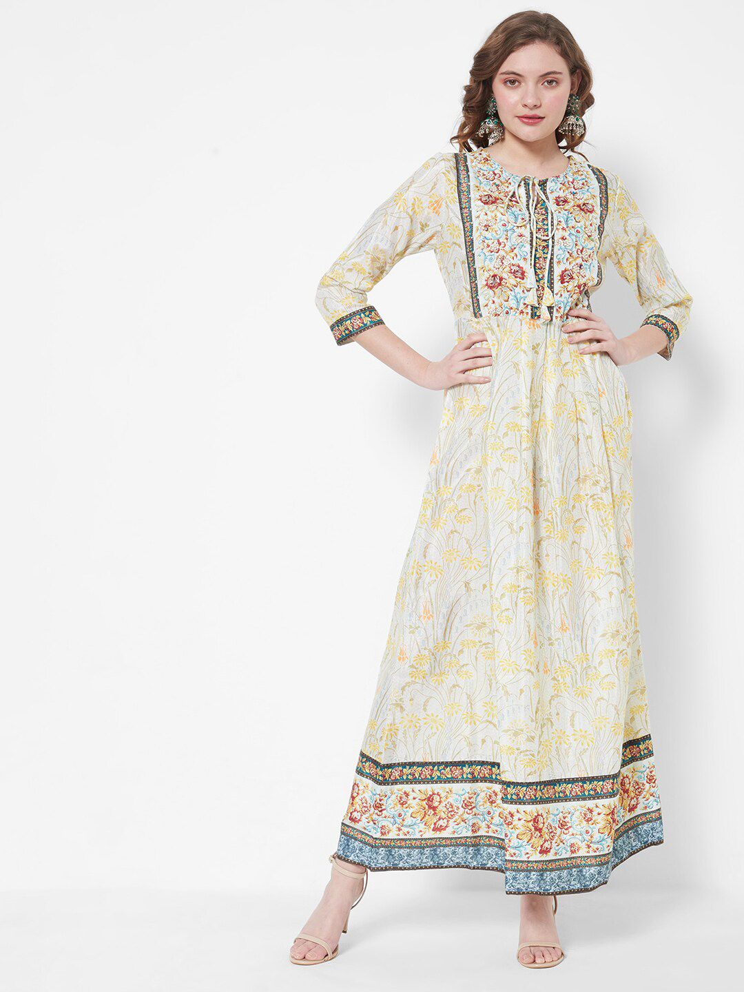 HEEPOSH Off White & Yellow Floral Printed Tie-Up Neck Ethnic Maxi Dress Price in India