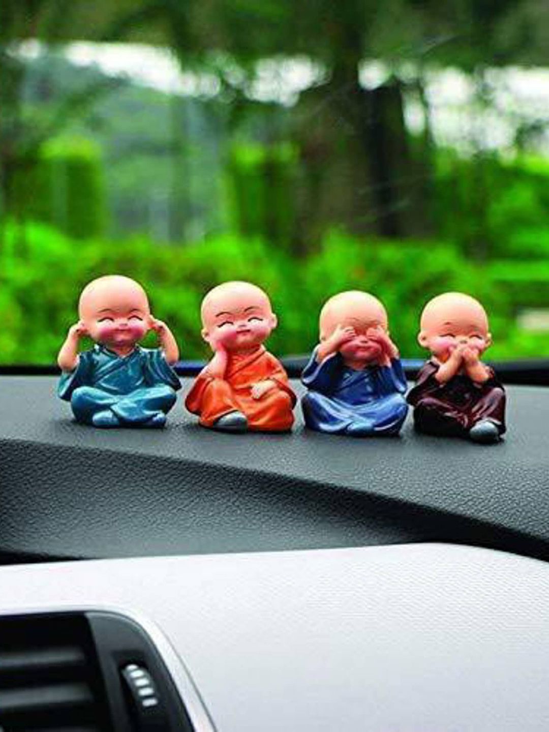 Fashion Bizz Set of 4 Orange & Blue Solid Baby Buddha Showpieces Price in India