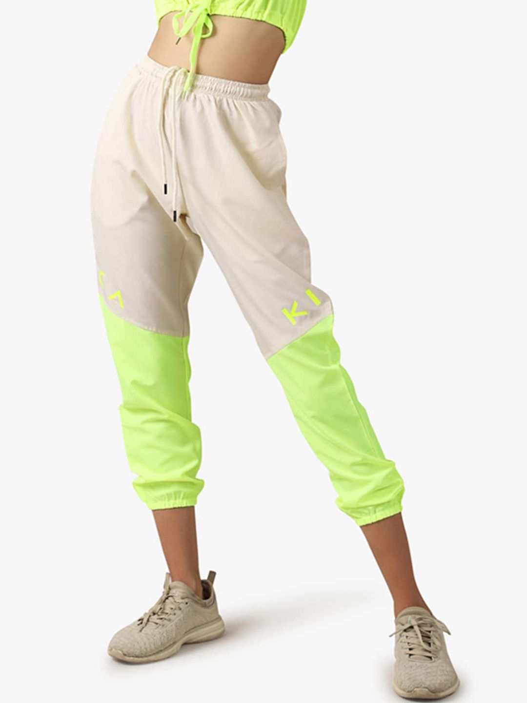 KICA Women Fluorescent Green Printed Track Pants Price in India