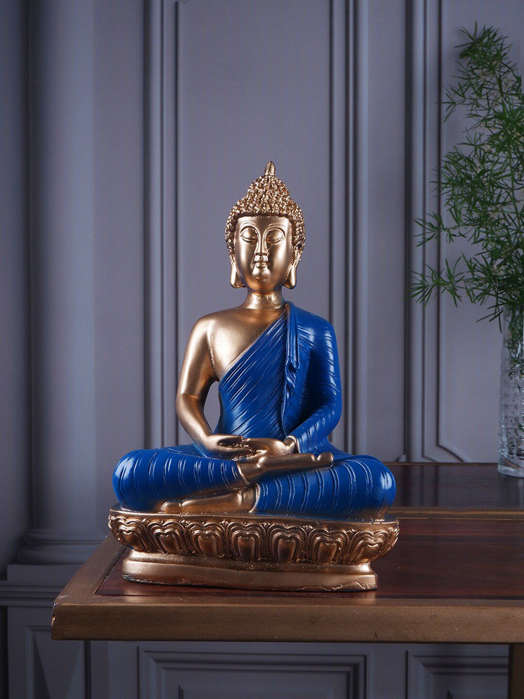 THE WHITE INK DECOR Blue & Gold Toned Buddha figurine Showpiece Price in India