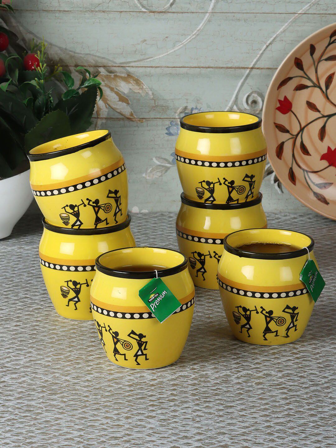 CDI Yellow & Black Printed Ceramic Glossy Kulladhs Set of 7 With Wooden Tray Price in India