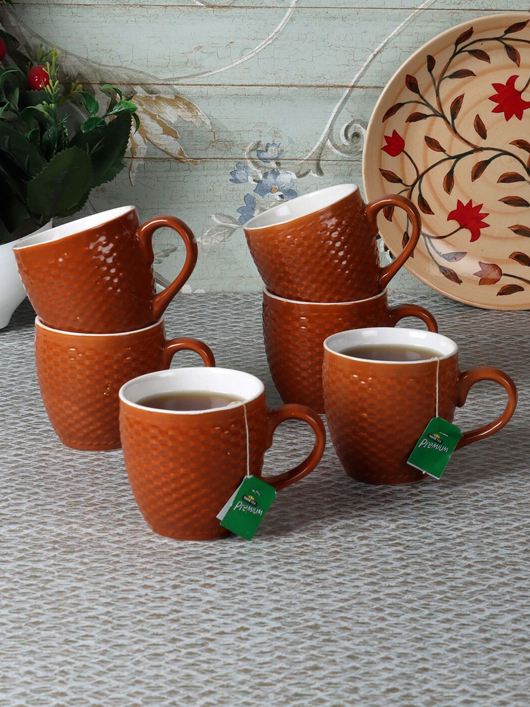 CDI Brown & White Set of 7 Textured Ceramic Glossy Cups and Mugs Price in India