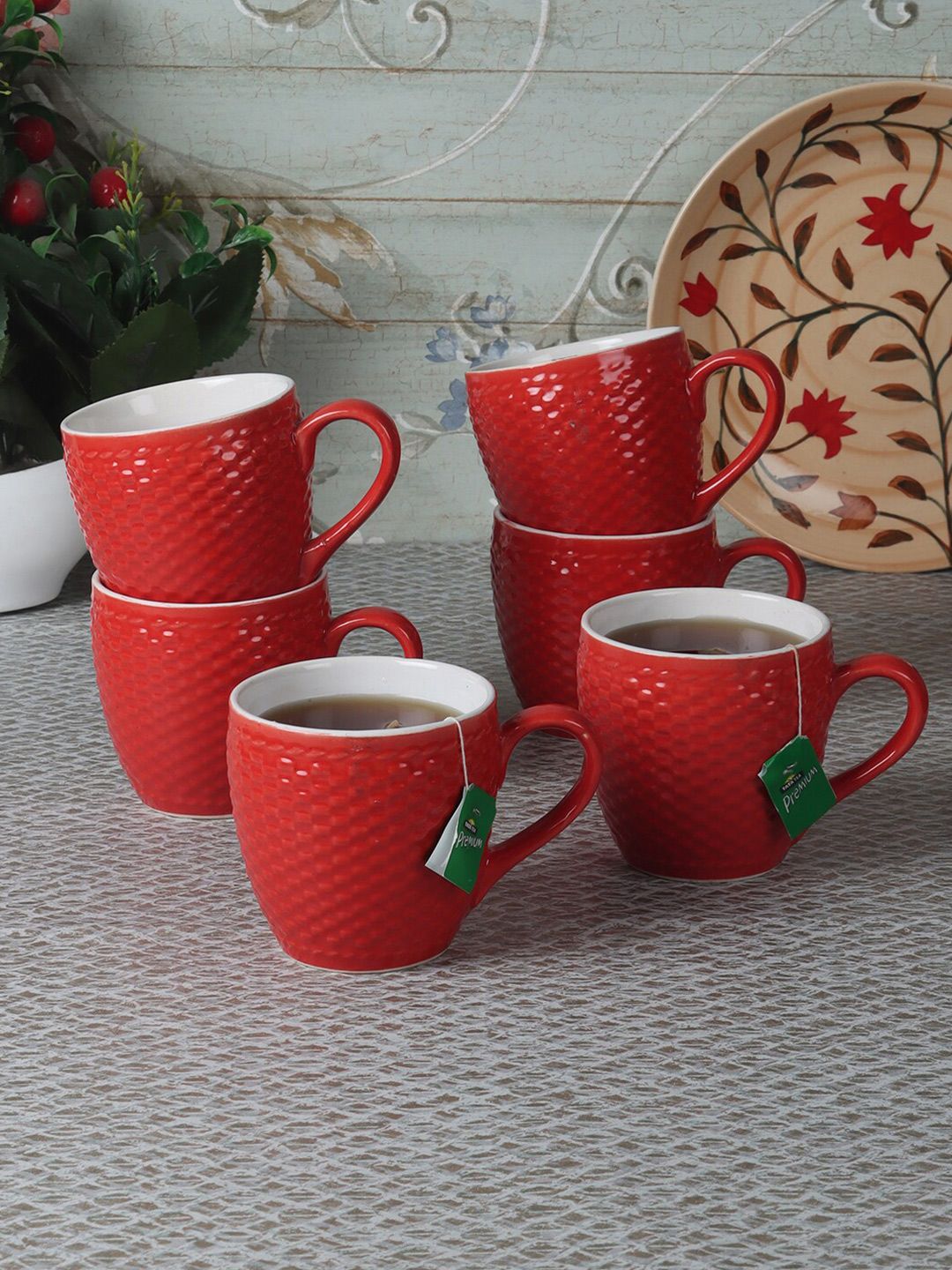 CDI Red & White Set of 7 Textured Ceramic Glossy Cups and Mugs Price in India