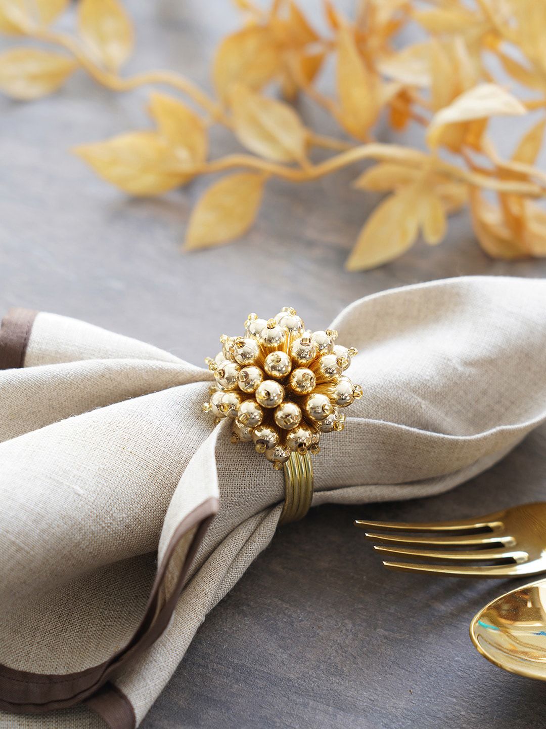 Pure Home and Living Set Of 4 Gold-Toned Table Napkin Rings Price in India
