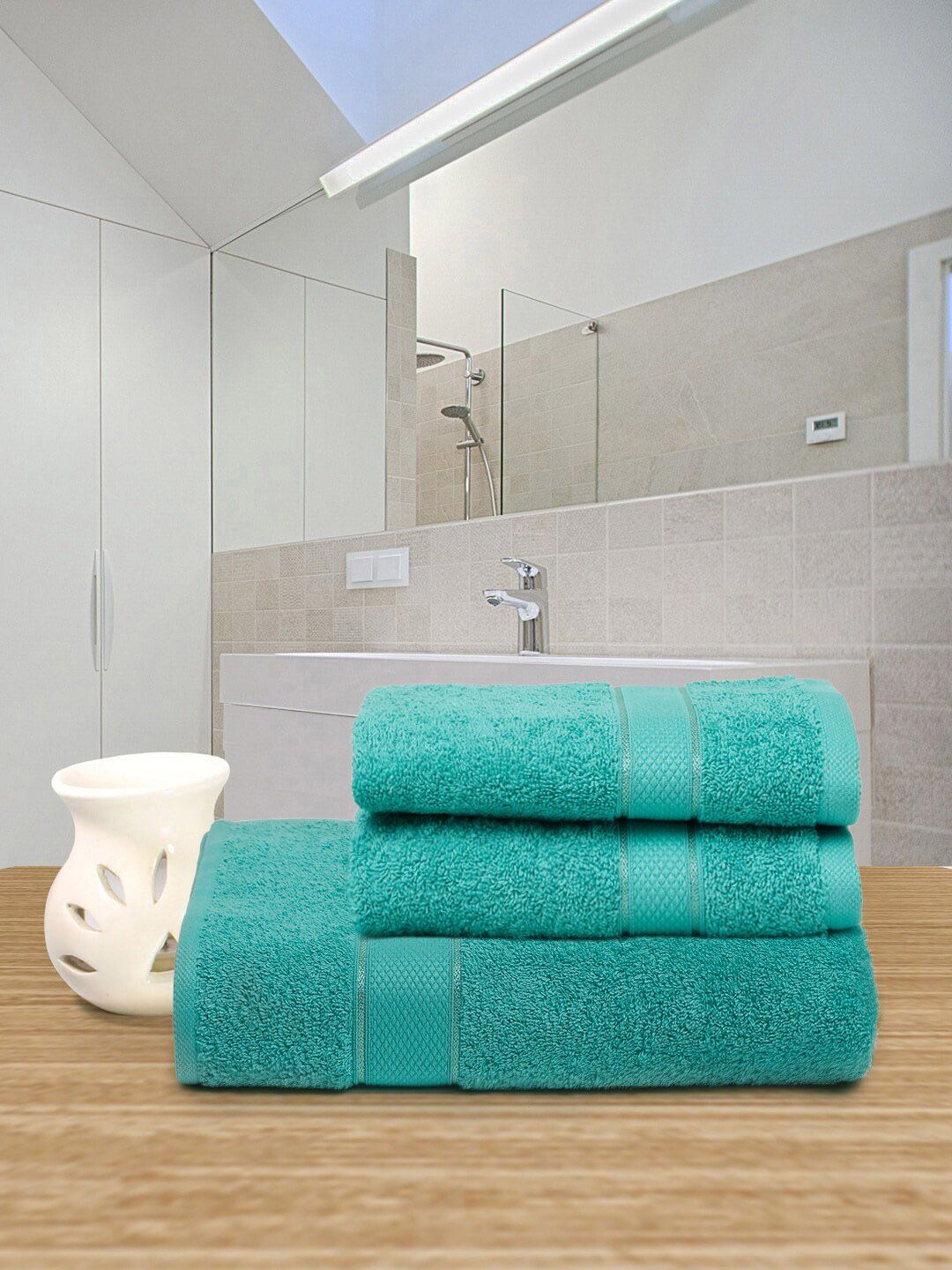 Creeva Pack Of 3 Sea Green Solid 525 GSMPure Cotton Towel Set Price in India