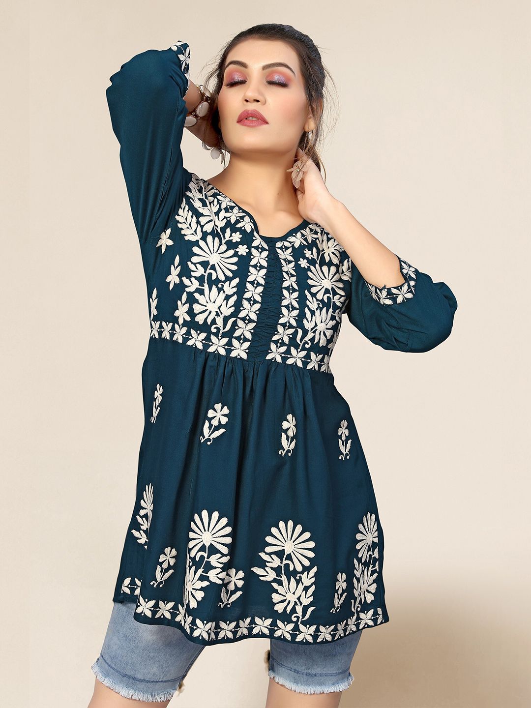 Winza Designer Women Blue Floral Embroidered Top Price in India