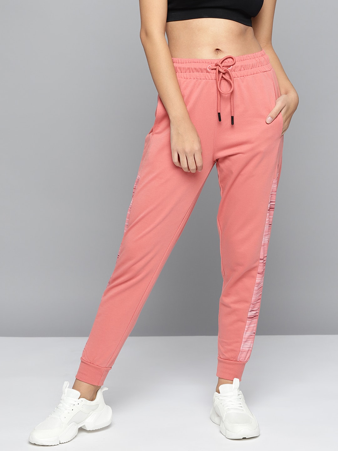 Alcis Women Peach-Coloured Solid Slim-Fit Training Joggers with Side Taping Price in India