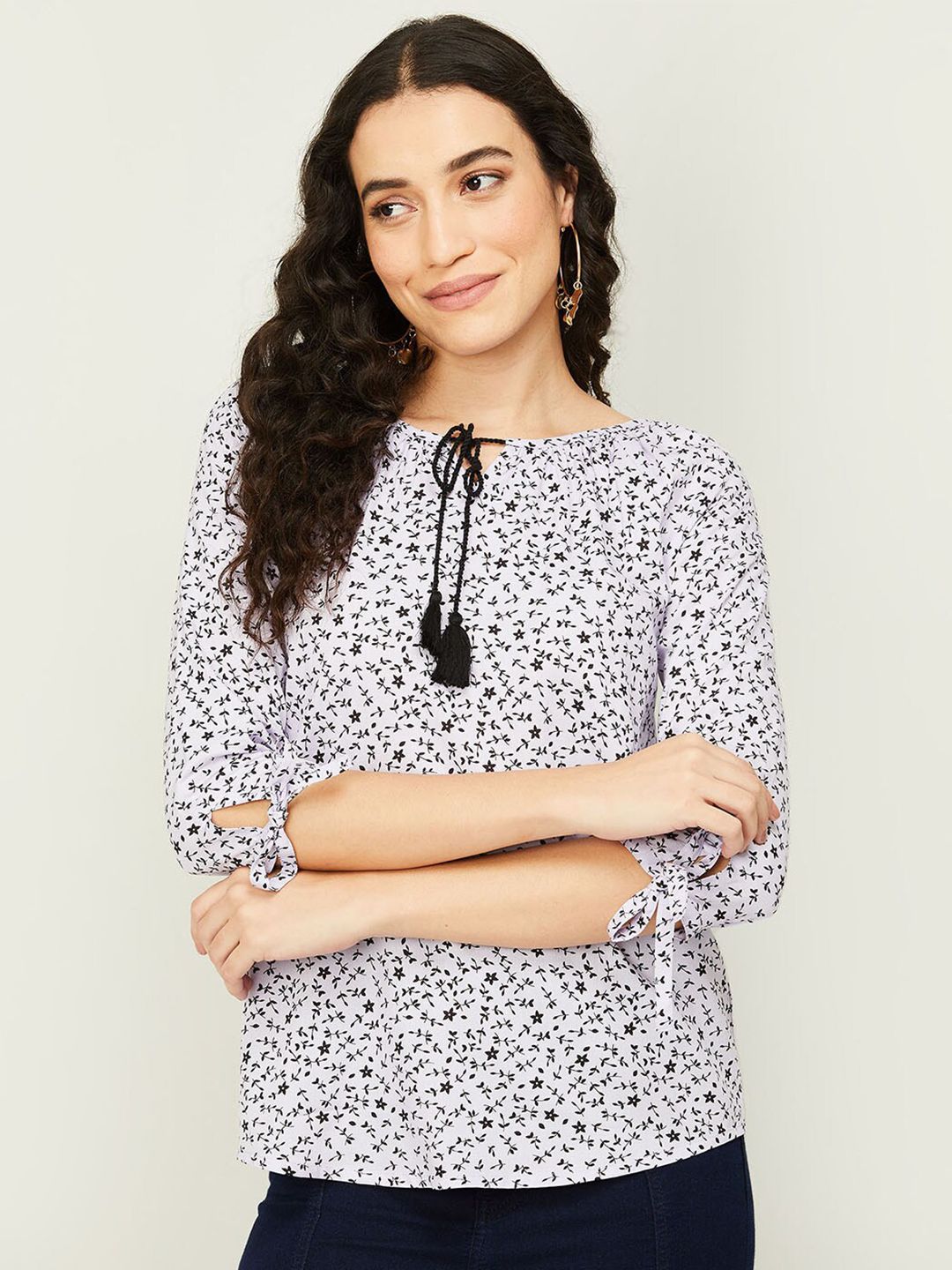 Fame Forever by Lifestyle Floral Print Tie-Up Neck Top Price in India