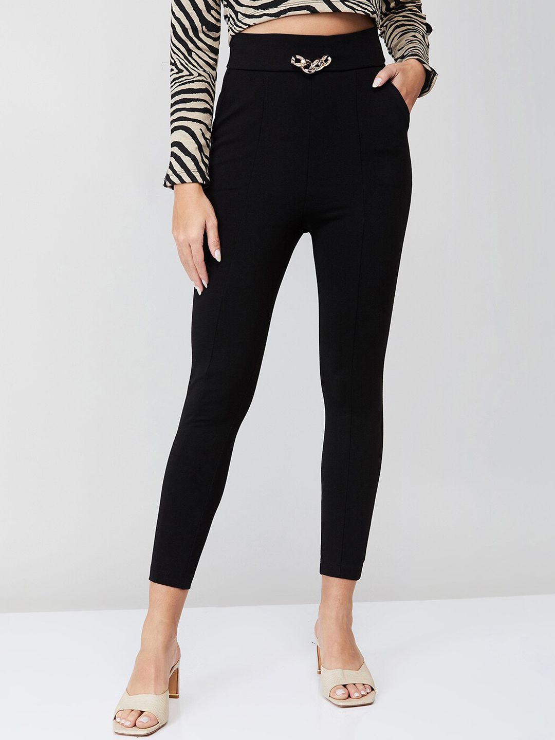 Ginger by Lifestyle Women Black Skinny Fit Pleated Trousers Price in India