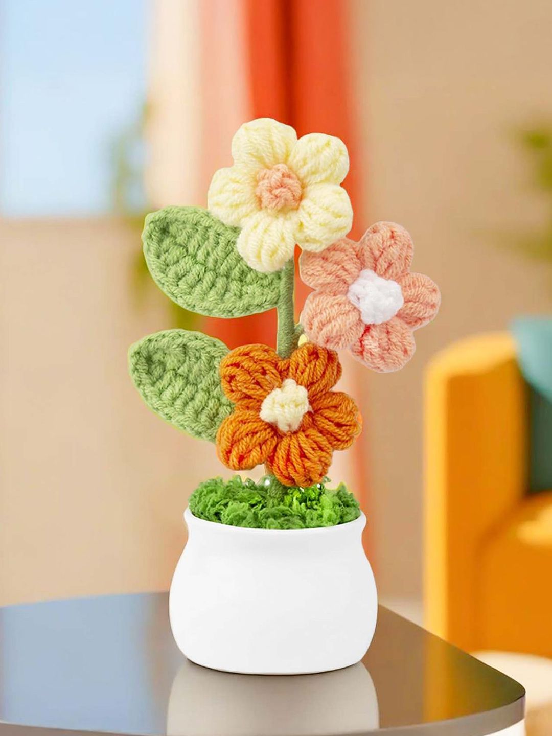 Ekhasa Nostrae by Ekhasa Crochet Green & Orange Colored Blossom Artificial Flower With Pot