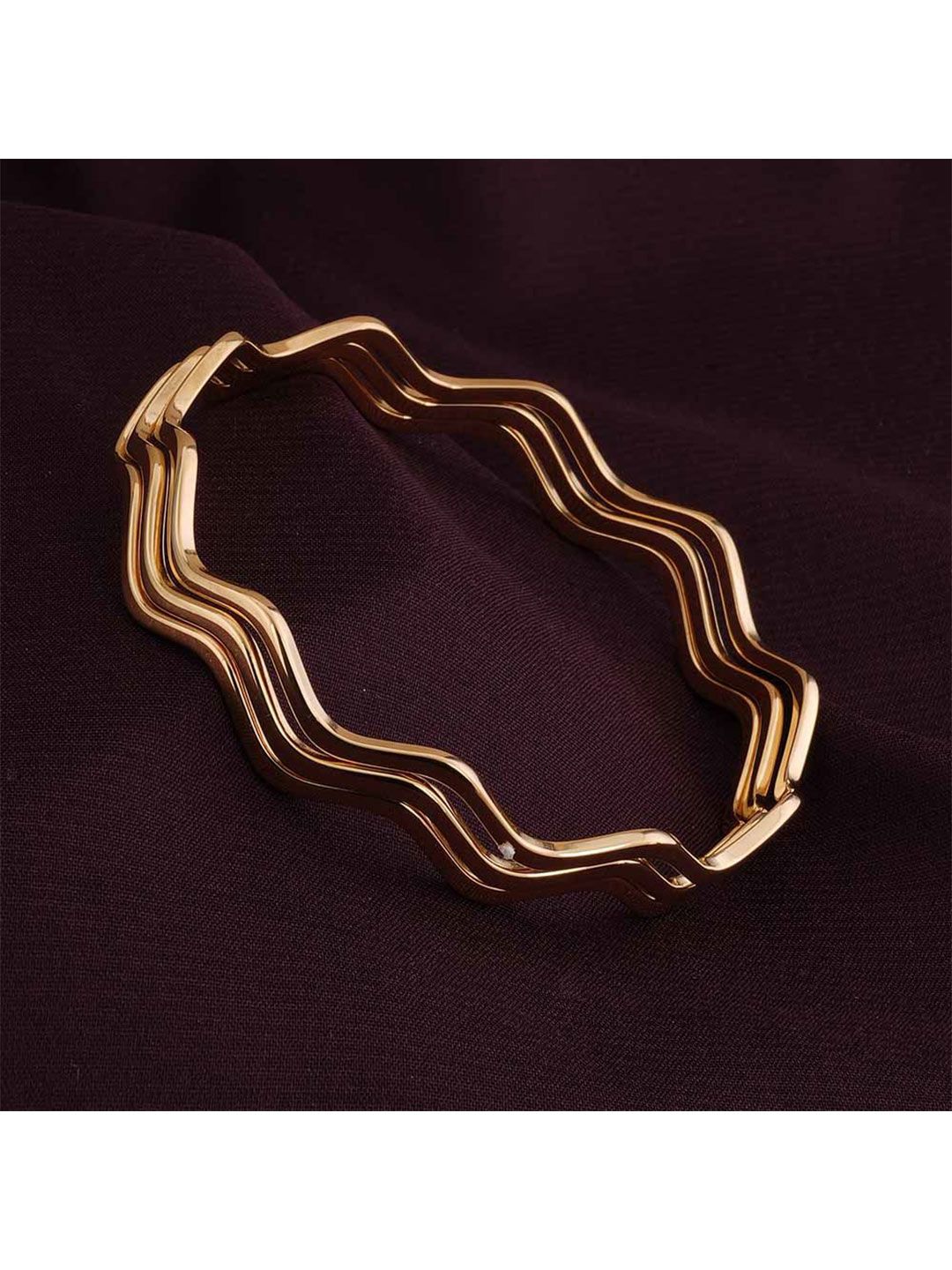 PALMONAS Women Gold-Plated Bangle-Style Bracelet deal from myntra