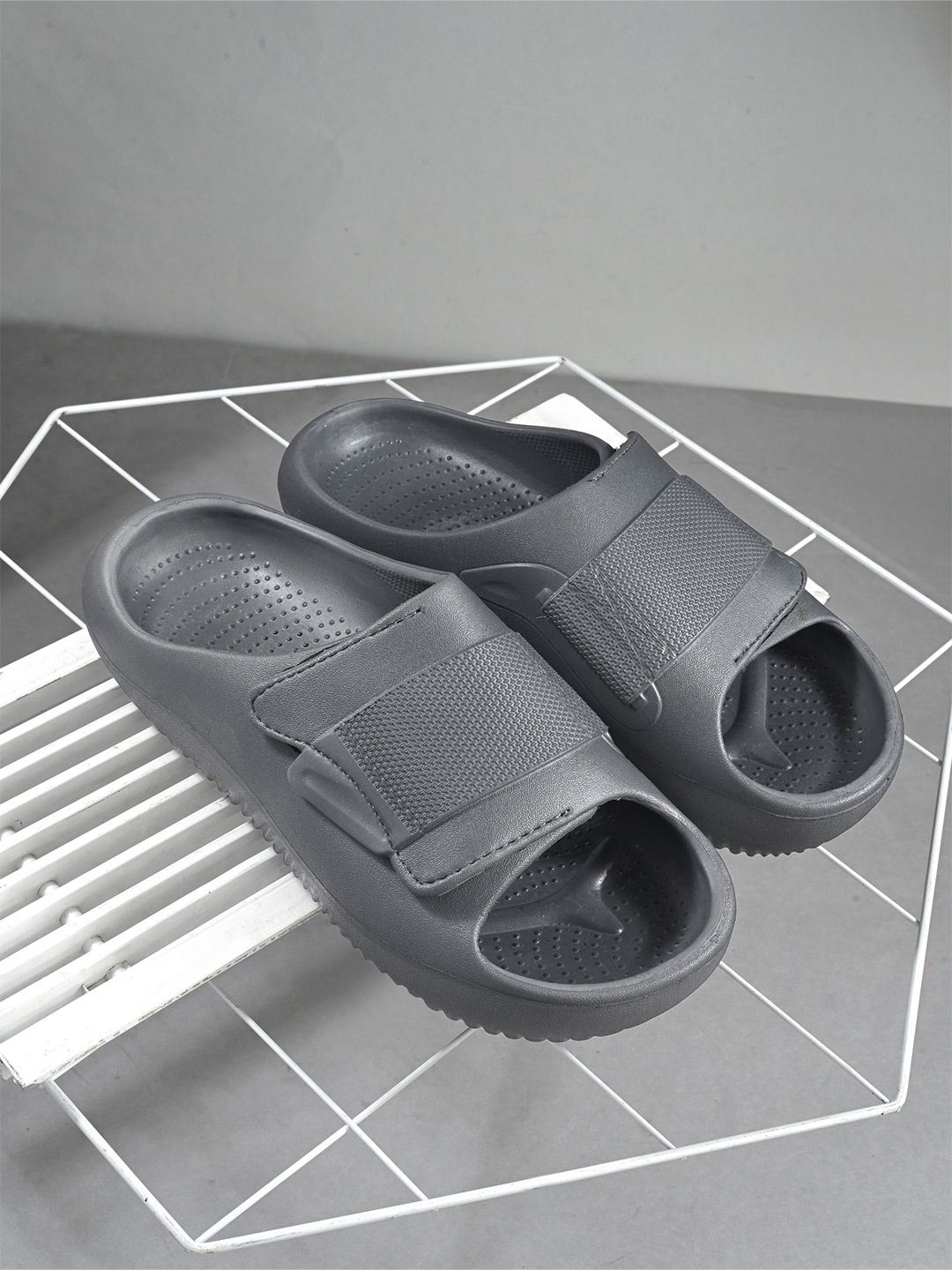 AfroJack Men Sliders Flip Flops deal from myntra