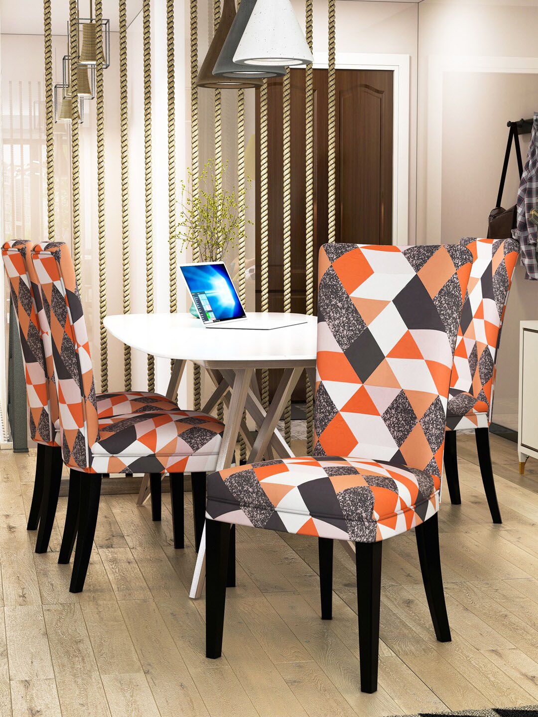 Nendle Set of 4 Orange & Black Printed Stretchable Dining Table Chair Covers Price in India