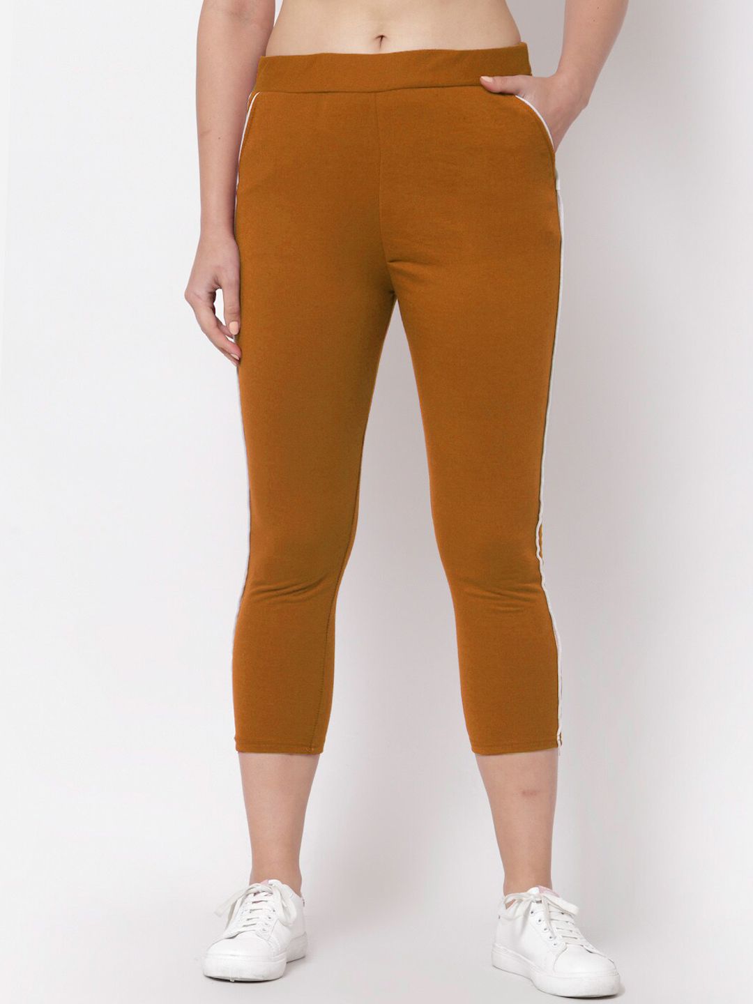 KLOTTHE Women Orange Solid Slim Fit Rapid Dry Track Pants Price in India