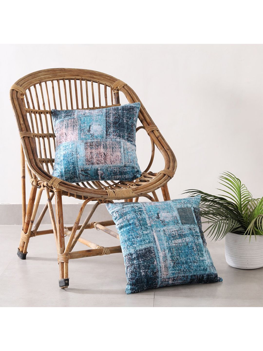 HANDICRAFT PALACE Turquoise Blue & White Set of 2 Geometric Velvet Square Cushion Covers Price in India