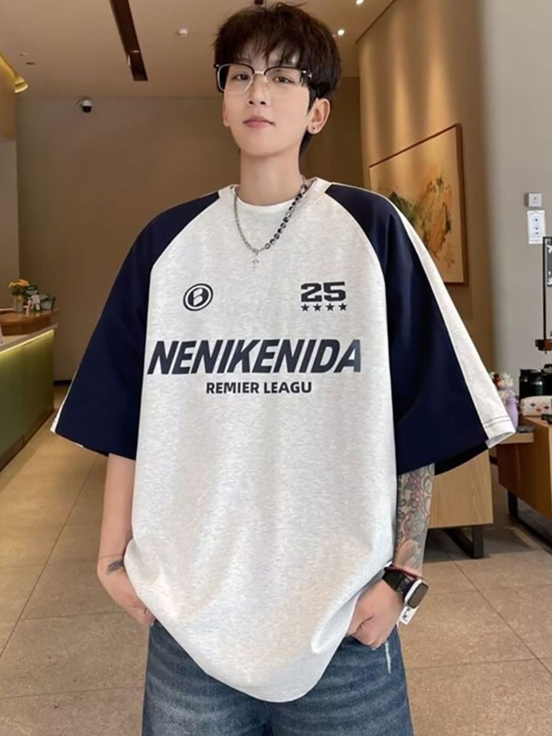 StyleCast x Revolte Men Typography Printed Oversized T-shirt
