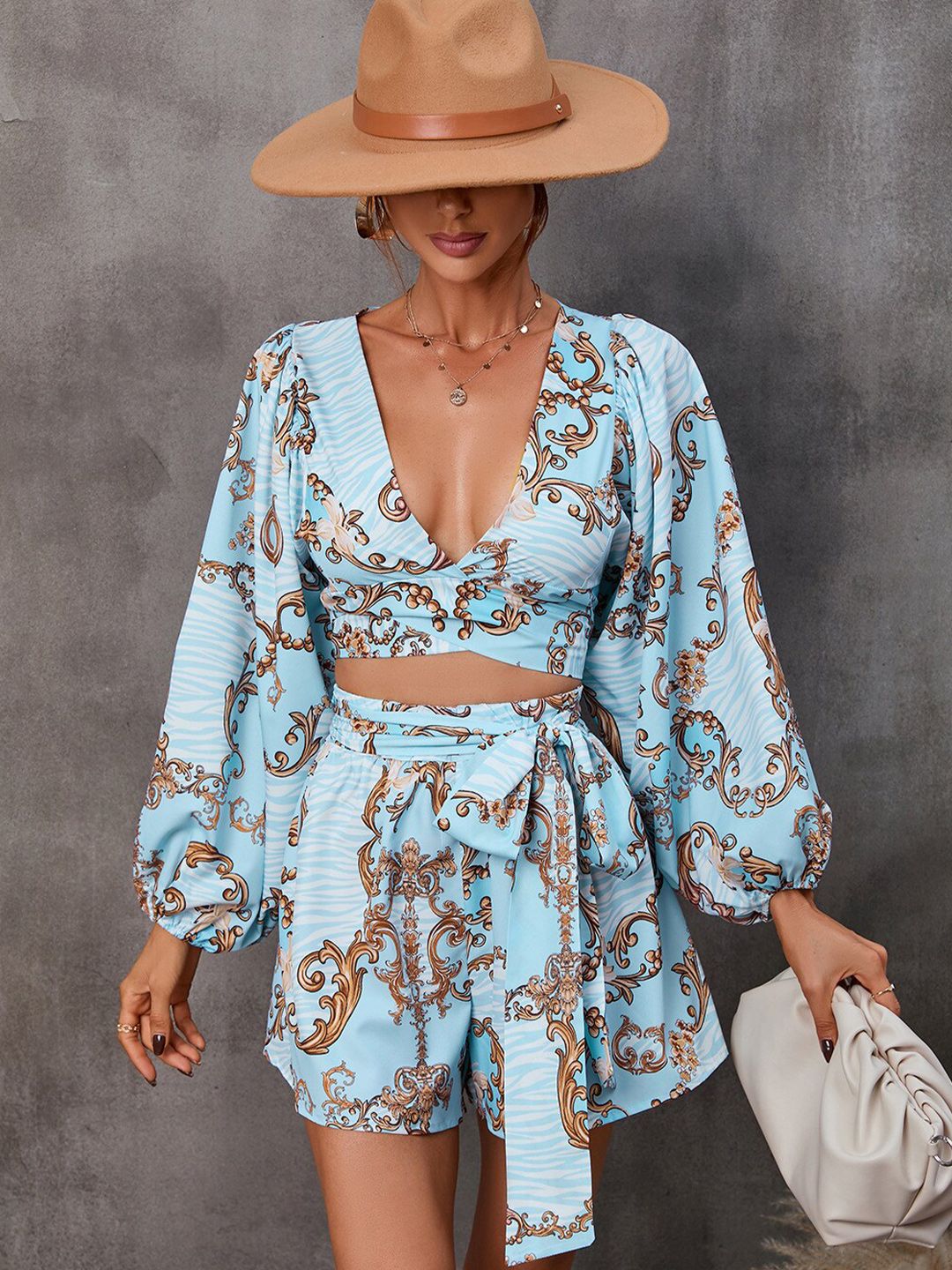 StyleCast Blue Conversational Printed Cut-Outs V-Neck Playsuit