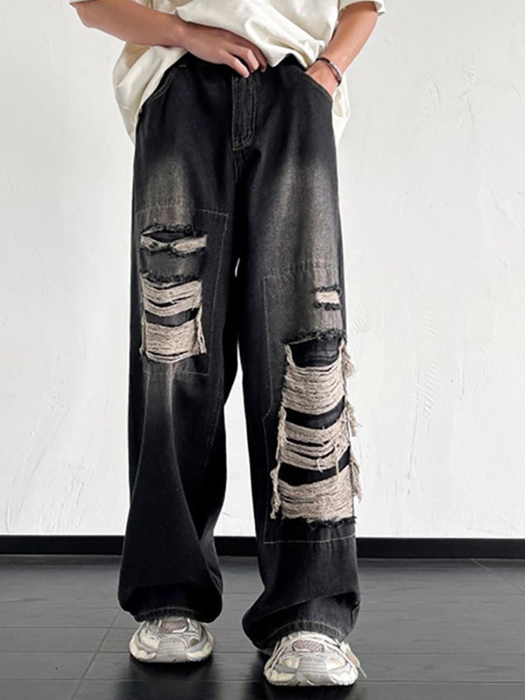 StyleCast x Revolte Men Wide Leg Mildly Distressed Light Fade Jeans