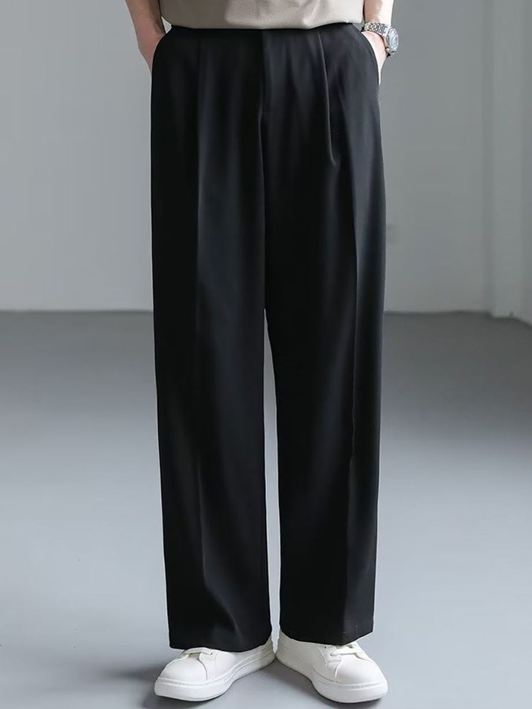Buy StyleCast x Revolte Men Solid Loose Fit Pleated Parallel