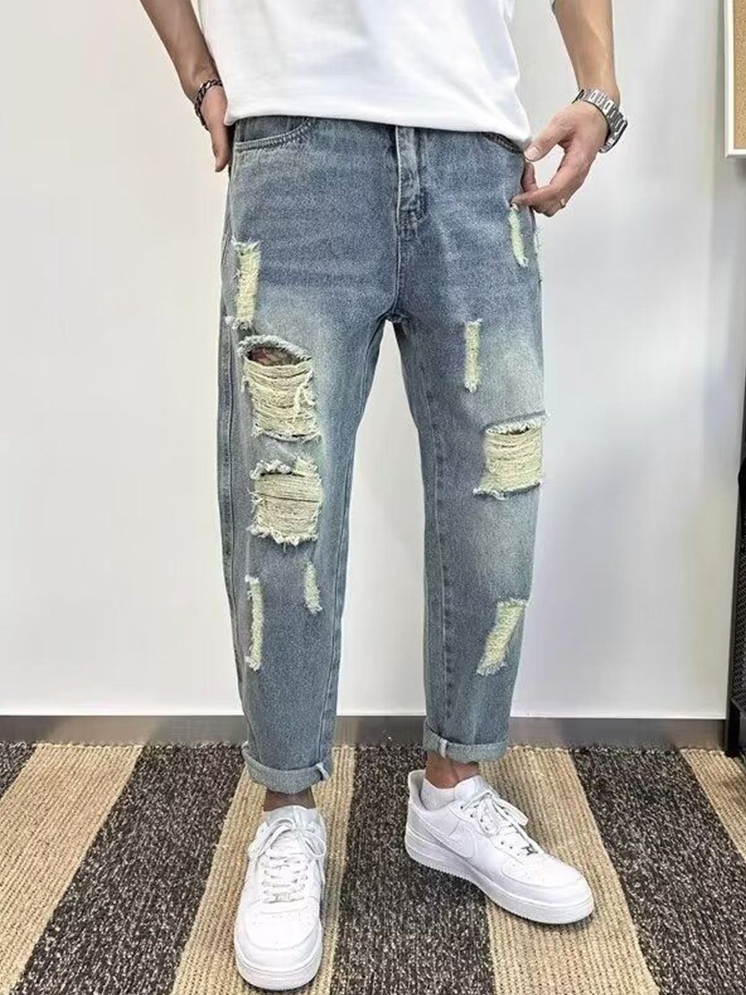 StyleCast x Revolte Men Straight Fit Mid-Rise Mildly Distressed Stretchable Jeans